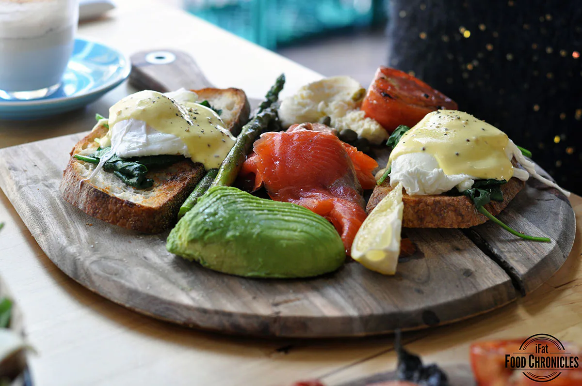 The Tiny Dancer: Platter of poached eggs, smoked salmon, capers, avocado, sauteed spniach, tomatoes, aspaaragus, bocconcini and crusty bread with hollandaise sauce