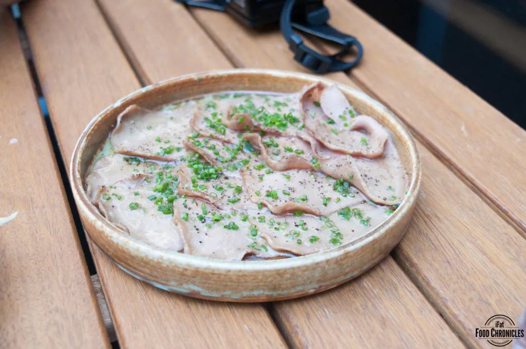 Ox tongue with beef fat, chives and lime
