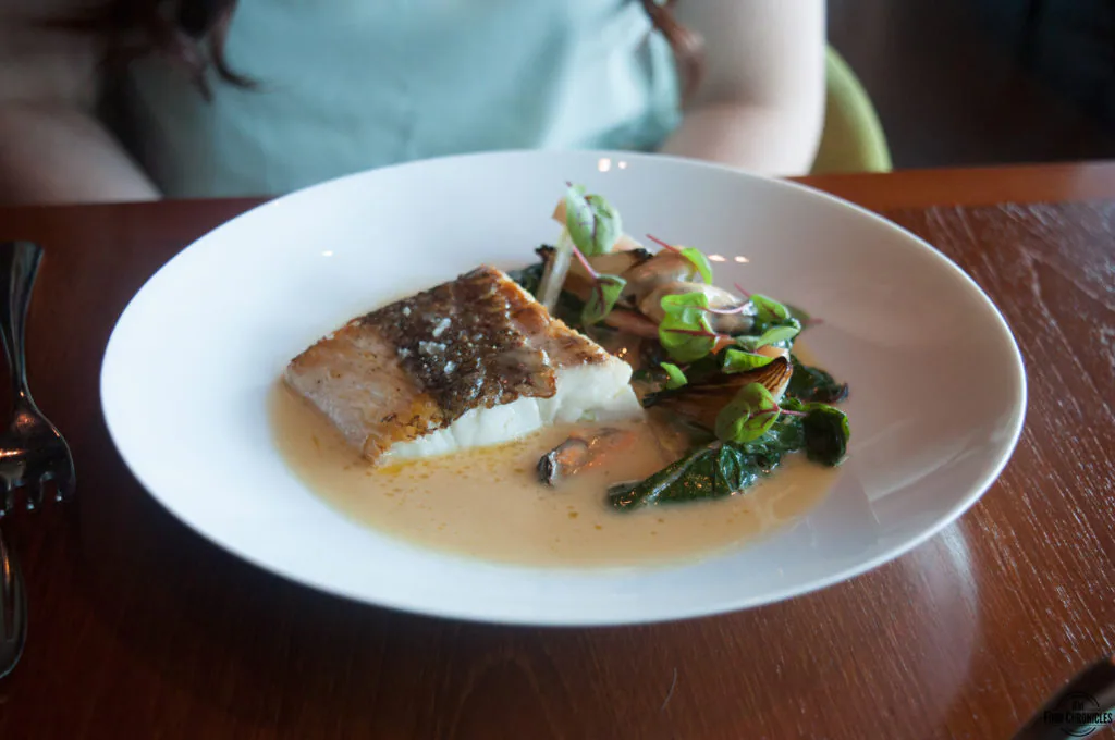 Roast Snapper in cider with silverbeet leaves, roast onions & fired mussels