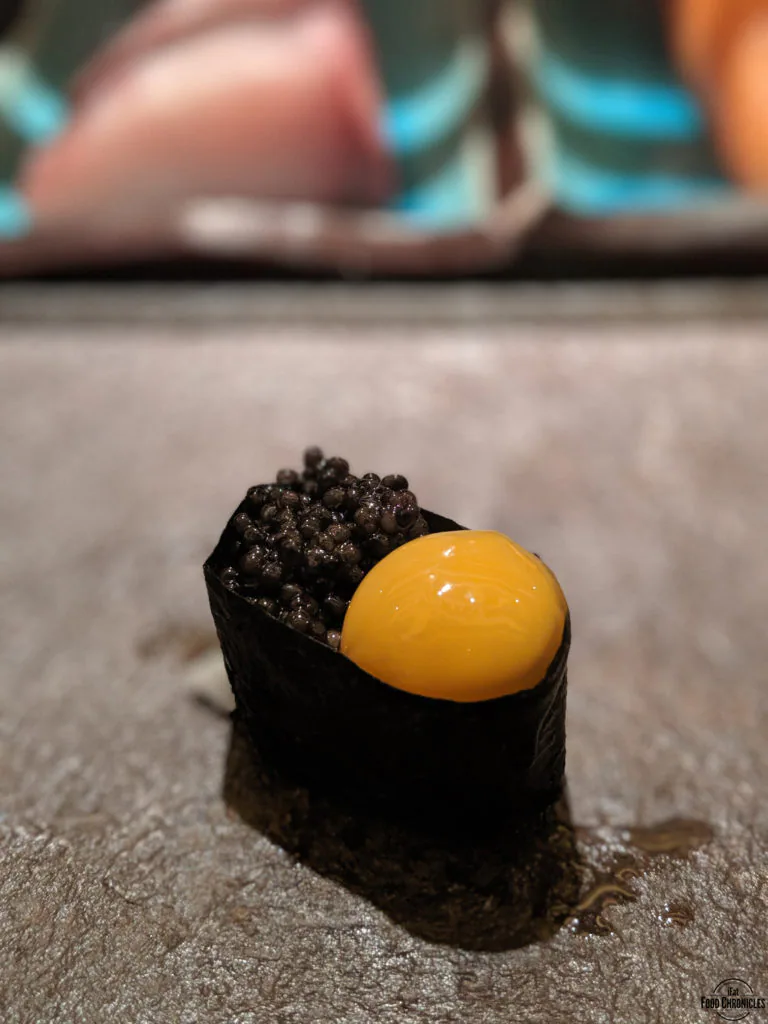 Quail egg yolk with caviar