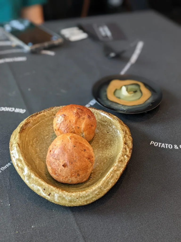Potato and Gravy. Chicken fat KFC gravy candle and a potato bun