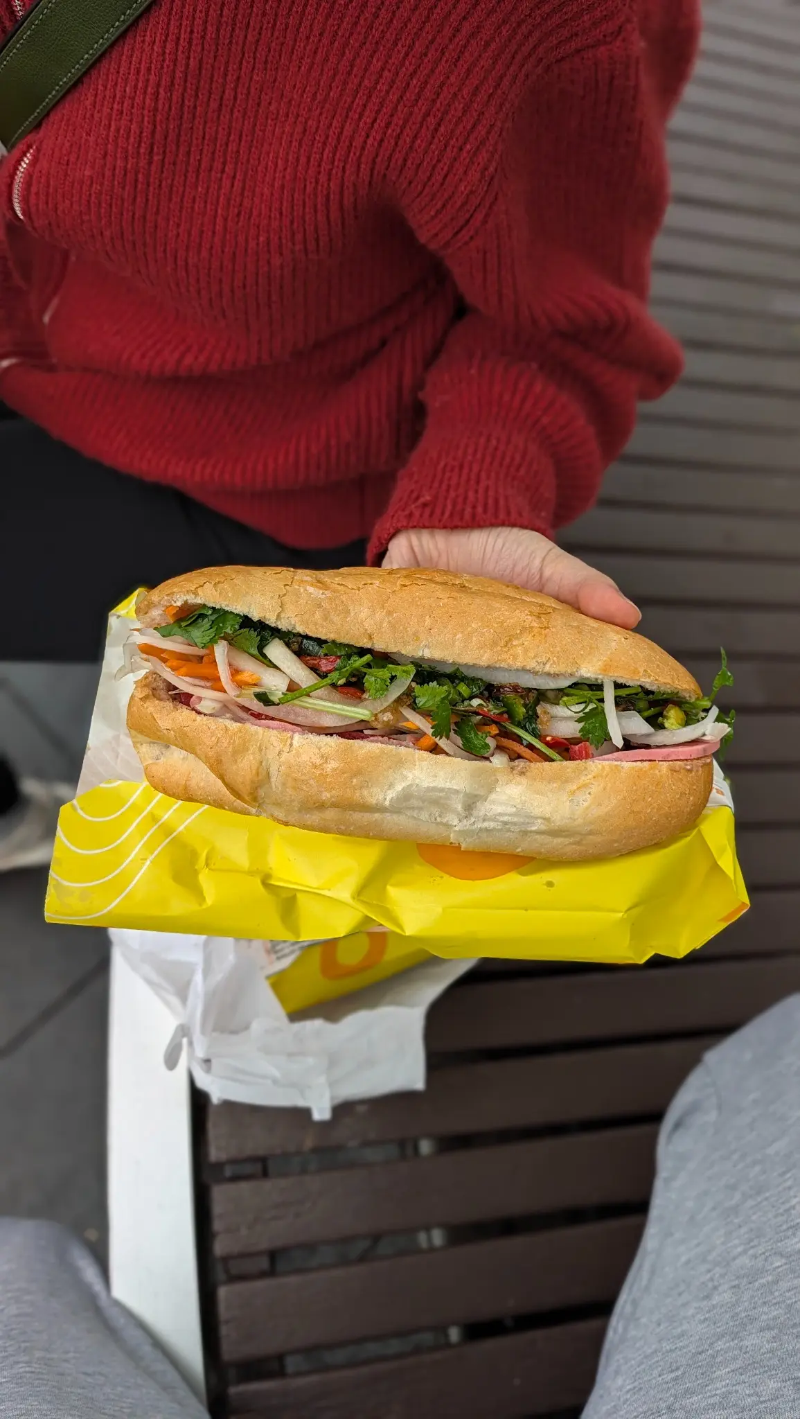 Banh Mi Bay Ngo traditional pork banh mi held outside the Bankstown bakery
