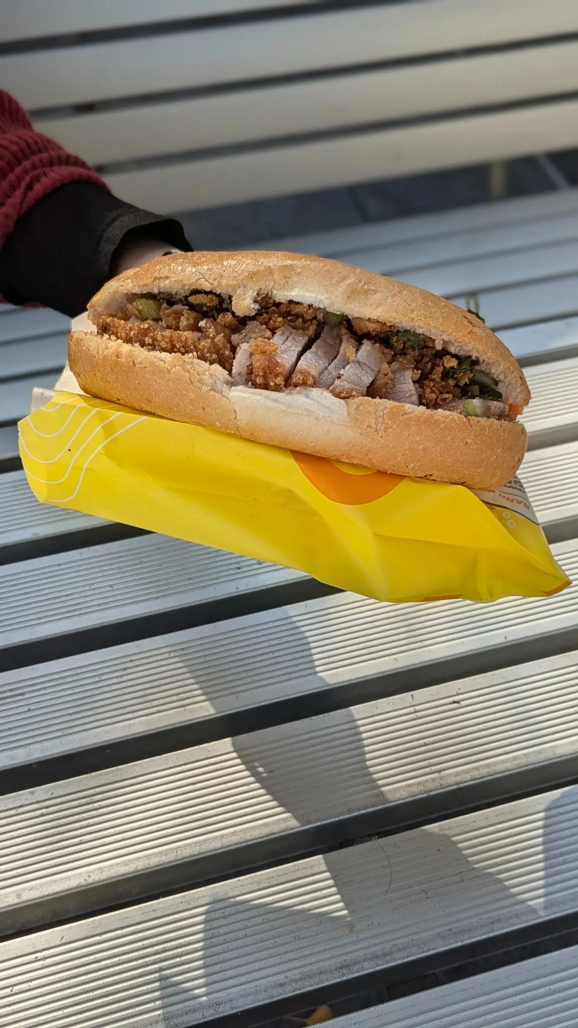 Banh Mi Bay Ngo roast pork banh mi with crisp crackling, pate and fresh vegetables