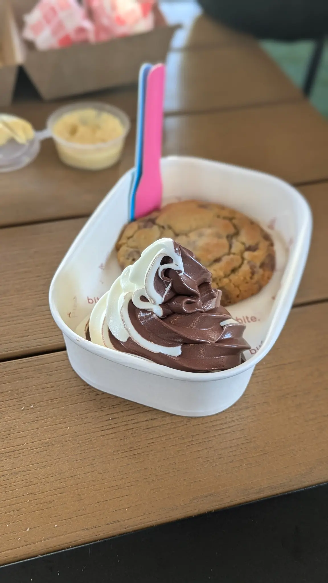 Chocolate and vanilla soft serve with a Bite chocolate chip cookie at Feel Good Burgers
