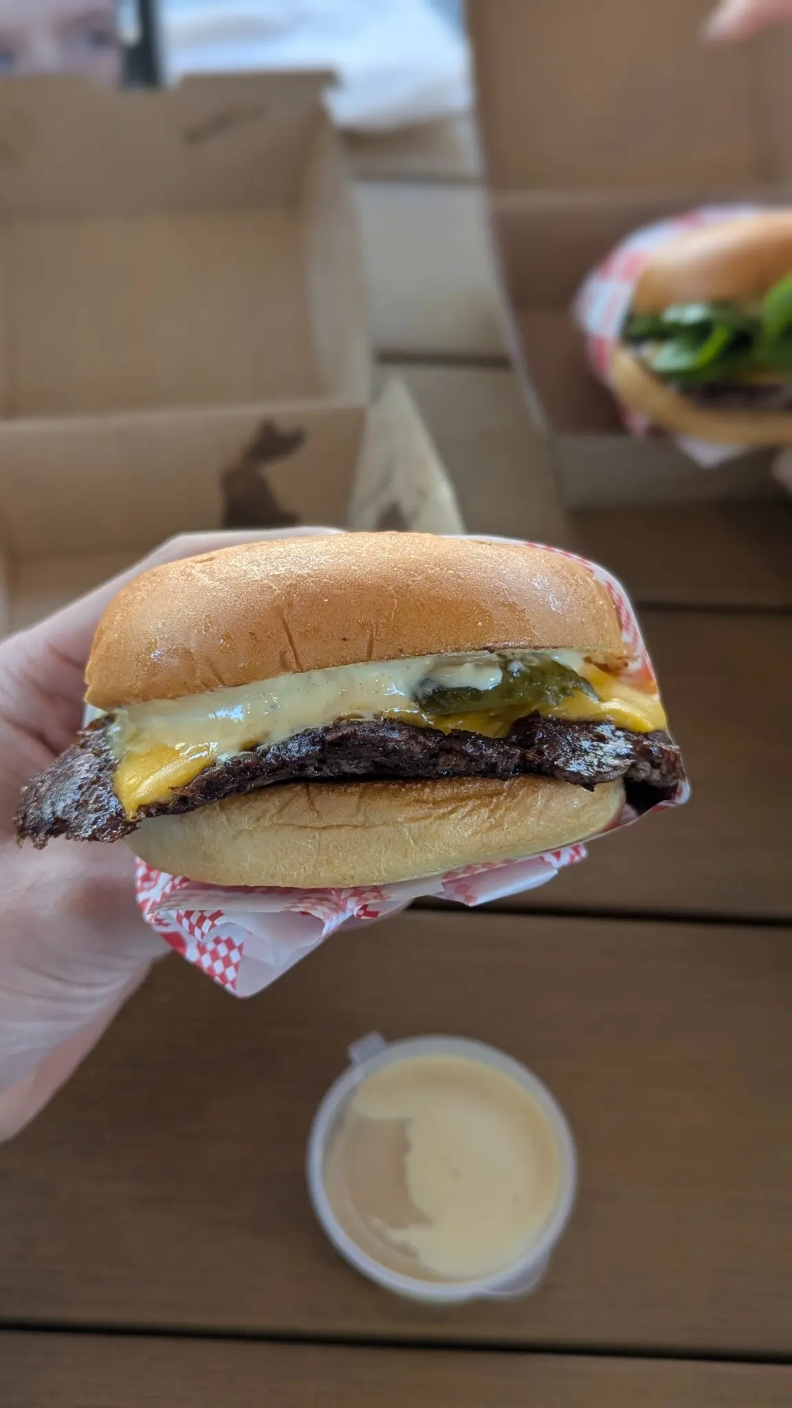 Feel Good Burgers classic smash burger with burger sauce, cheese and pickles