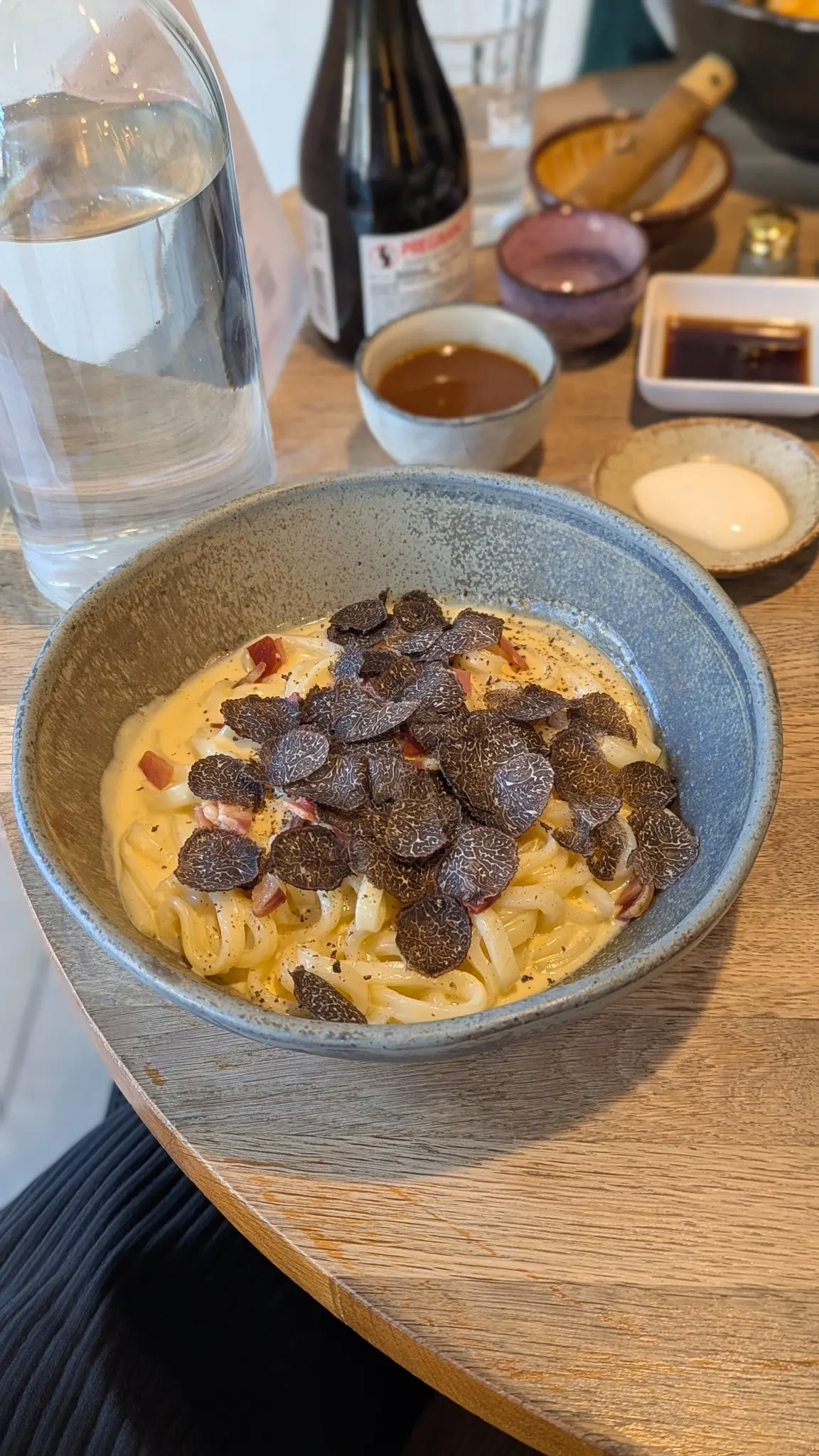 Juan Bowl & Tea limited-time truffle udon carbonara topped with shaved truffle