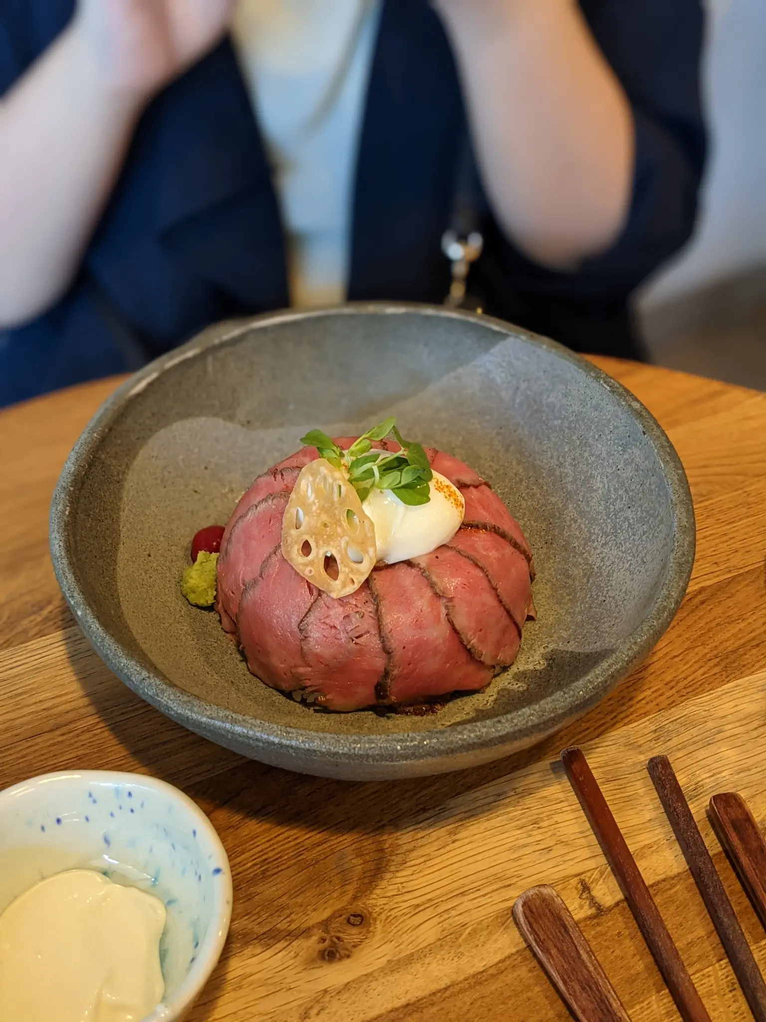 Juan Bowl & Tea wagyu beef bowl topped with an onsen egg and lotus root