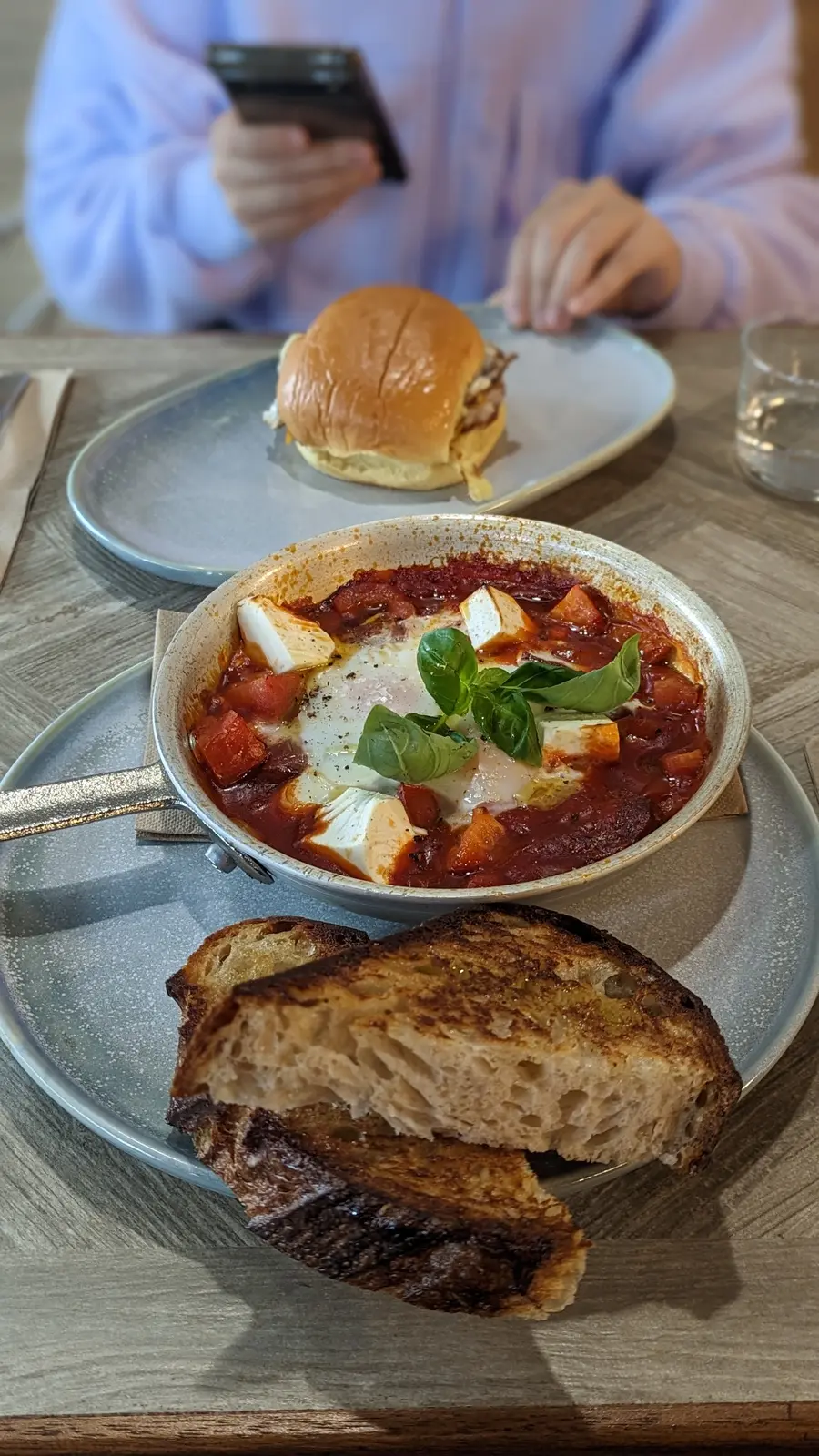 Mattina baked eggs with sujuk and stracciatella cheese