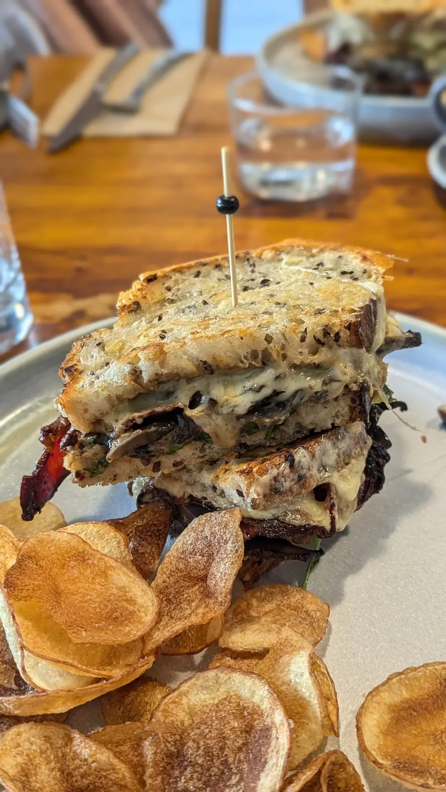 Mattina toasted mushroom sandwich with extra bacon and potato crisps