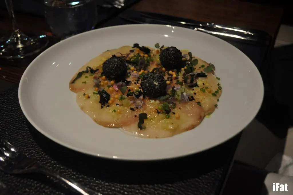 Sashimi of hiramasa kingfish, sesame custard, edamame puree, chardonnay and shallot dressing