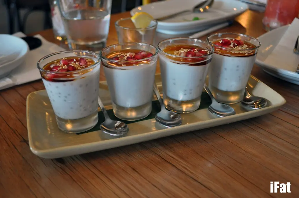 Chi’s tapioca shot with coconut custard, palm sugar, pomegranate and roasted sesame seeds