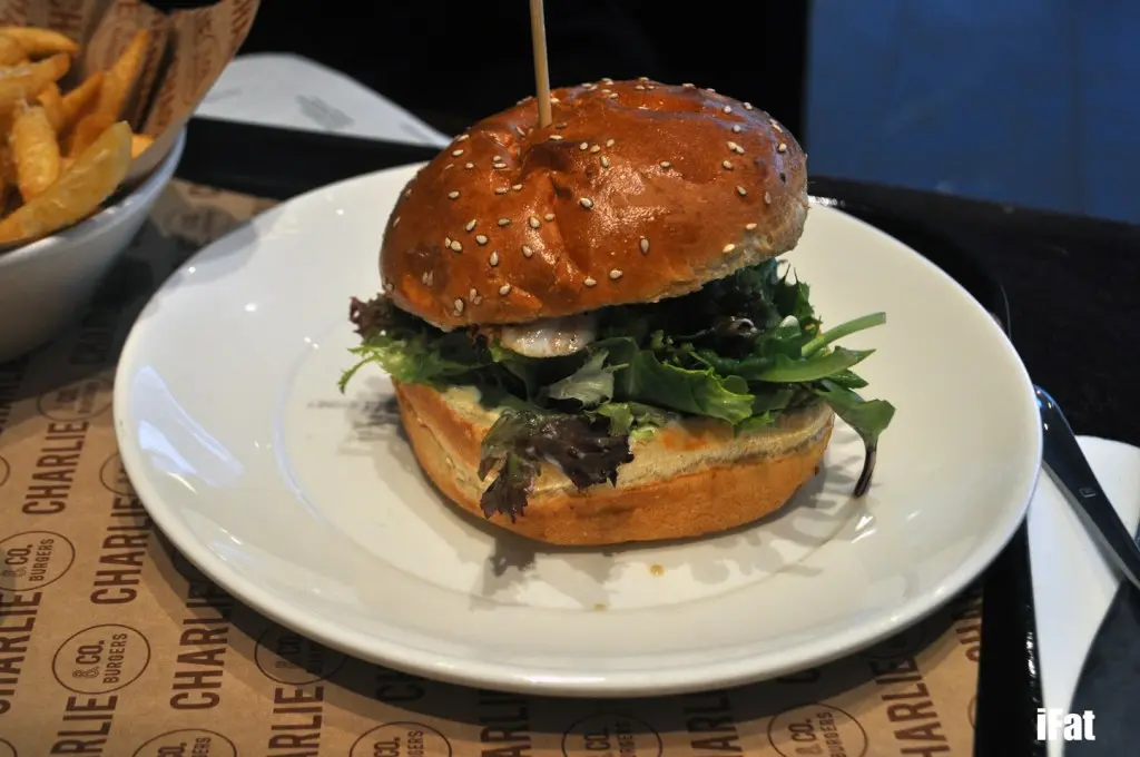Fish of the Day burger featuring chargrilled fish of the day, mixed leaf lettuce, pickled gherkins and aioli