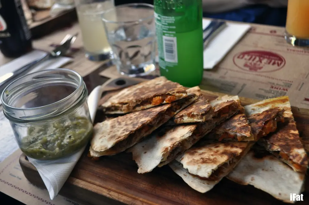 Quesadillas with chipotle chicken, portobello mushrooms, oregano and salsa borracha