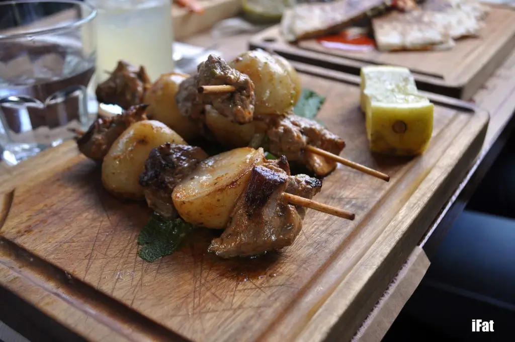 Marinated beef skirt & potato skewers with chimichurri dressing