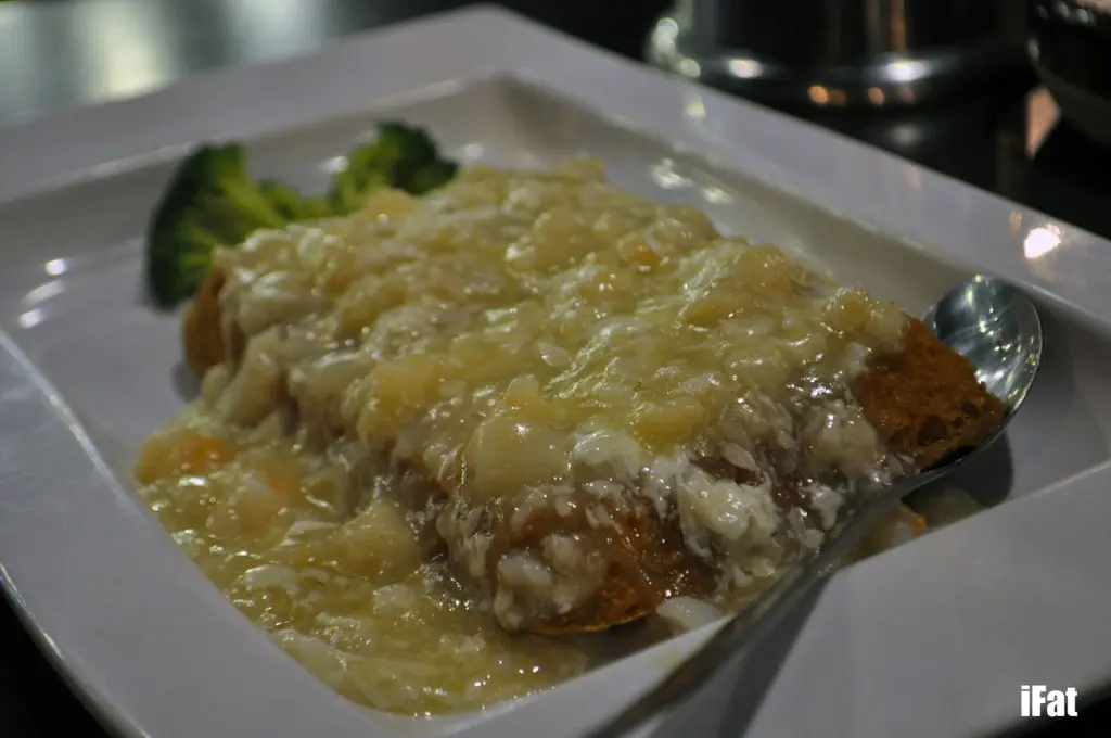 Deep fried tofu with seafood and egg white sauce