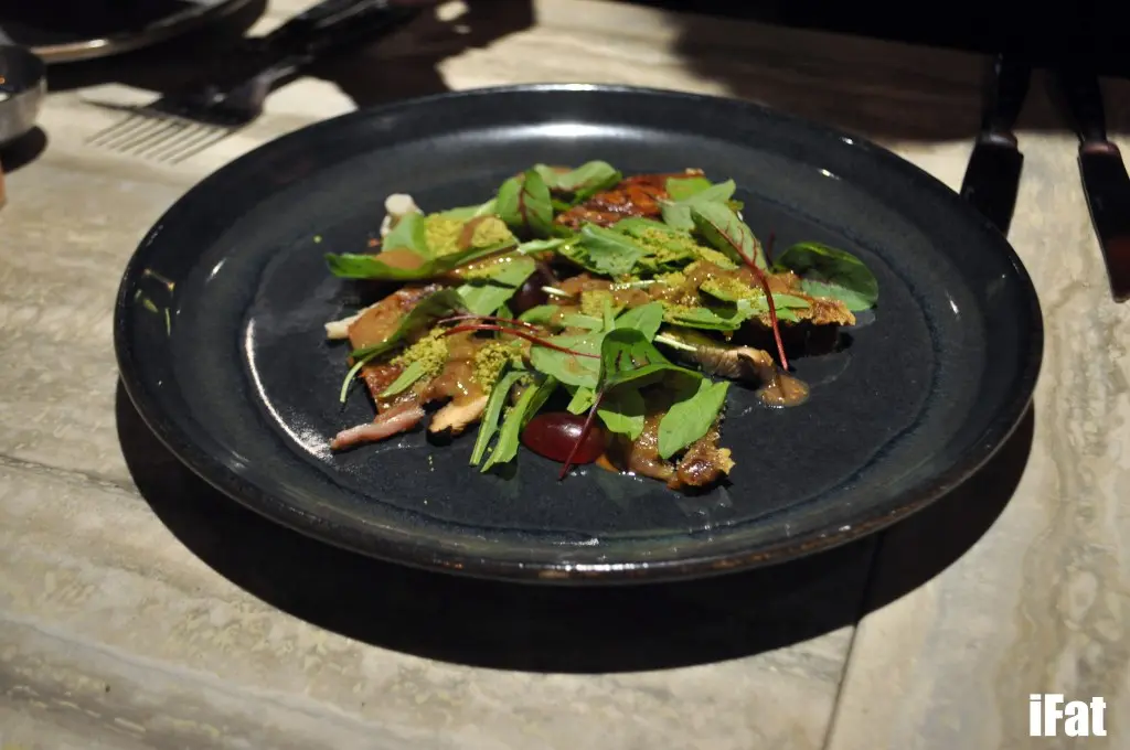 Crisp Pig’s Tail with Pine Purée, grapes, pickled mushrooms and pistachio