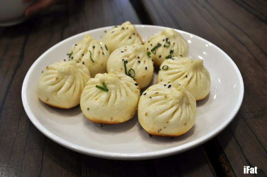Pan fried pork buns with sesame