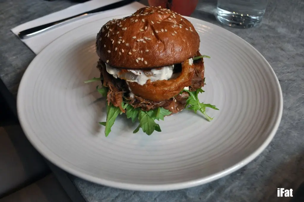 The hick burger: pulled lamb, onion rings, pickles and lettuce