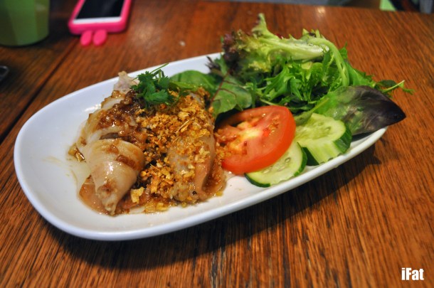 Squid coated with garlic sauce and stuffed with pork mince