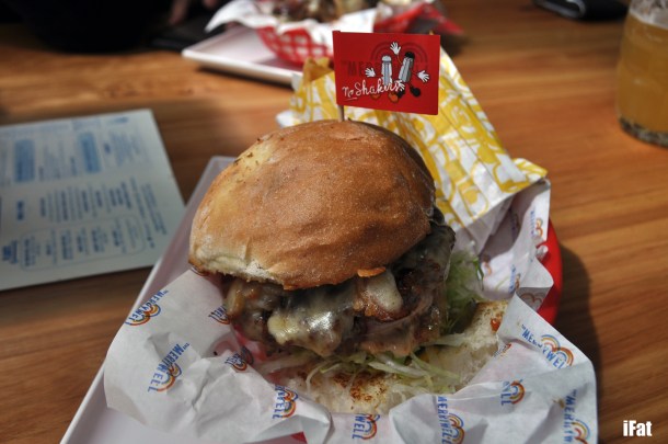 Lettuce, Cheese, Pickles, Onions, Tomato, Special Sauce, Bacon and some french fries on the side 