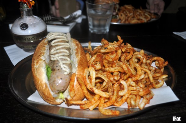 Mack Ducky Dog. Duck, orange and pistachio sausage with foie gras de canade & truffle sauce