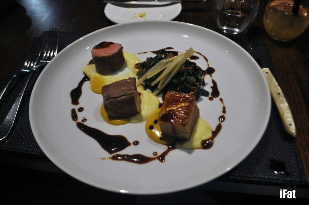 Pork tenderloin with crisp pork belly, braised swiss chard, apple puree, cider and mustard dressing