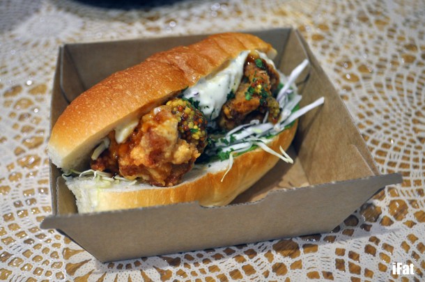 Chicken kara-age dog with coleslaw, lettuce, wholegrain mustard, parsley, tartar sauce and terriyaki sauce