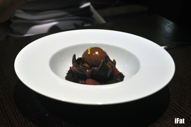 Chocolate with warm couverture ganache, fresh mint ice cream, raspberry mousse and chocolate cookie