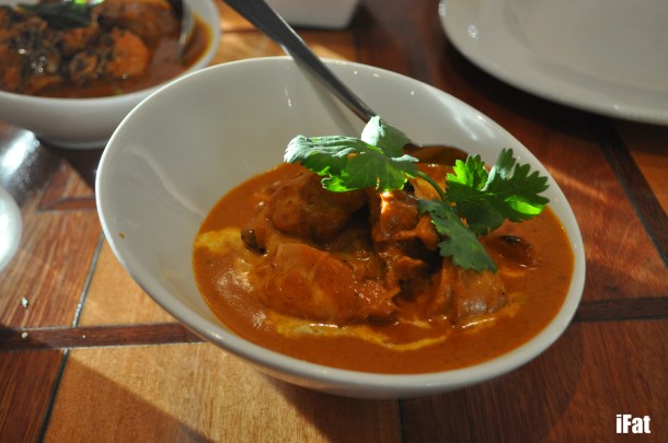 Chicken mahkni. Tender boneless chicken roasted in the tandoor then  finished with a subtly flavoured blend of tomato & cream.