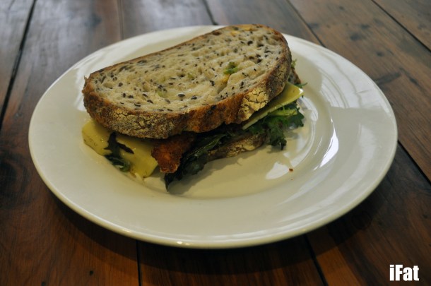 The Schnitty. Chicken schnitzel with avocado, lemon mayo, swiss and greens